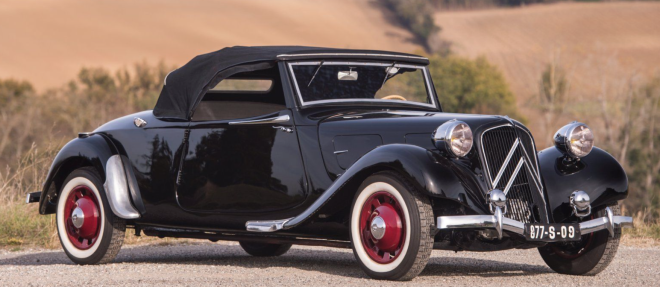 Black 1939 Citroën Traction 11 B cabriolet with red wheels