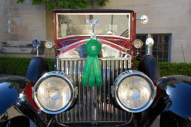 The grill and hood ornament of an award winning Rolls-Royce.