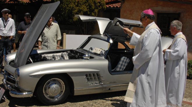 Silver Mercedes 300SL Gullwing being blessed
