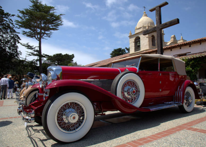 Lease a red Duesenberg from Pebble Beach