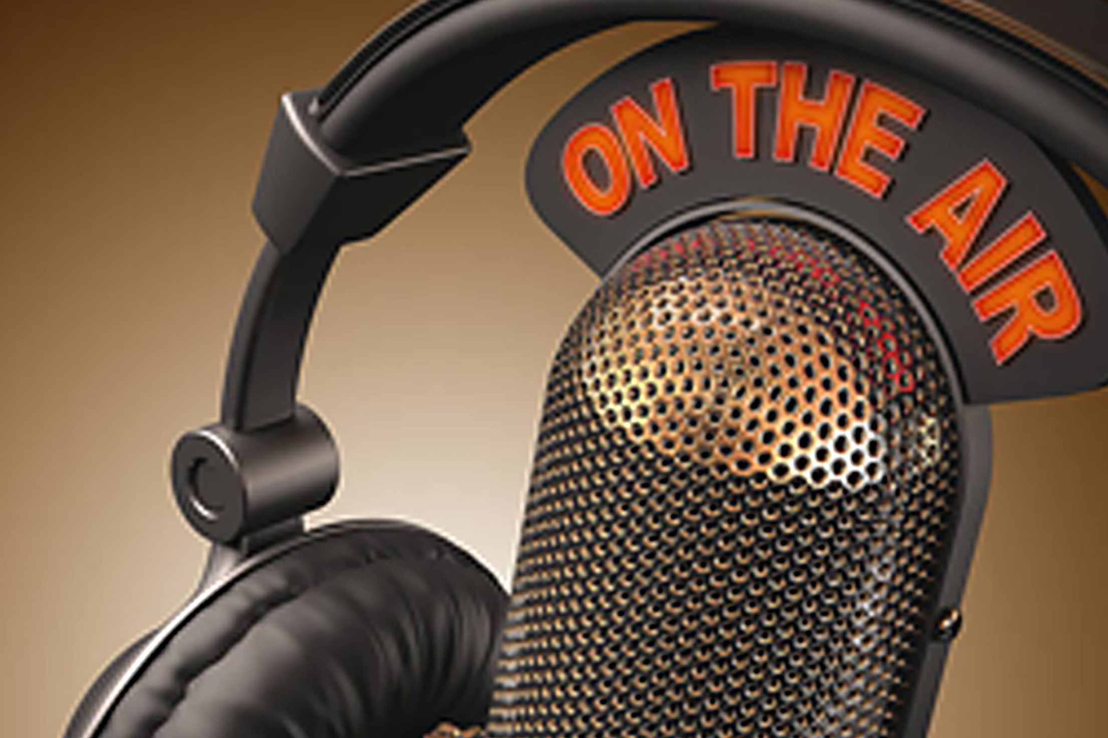 Close Up Of Microphone And Headphones With On The Air Sign