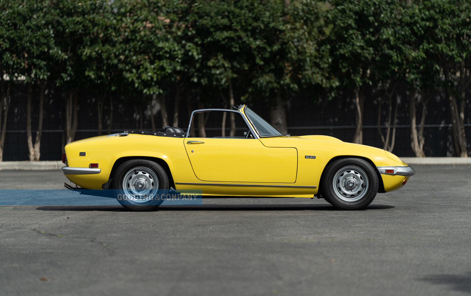 Yellow 1969 Lotus Elan SE-Convertible Passenger Side at Gooding Auction. Lease a Lotus wth Premier