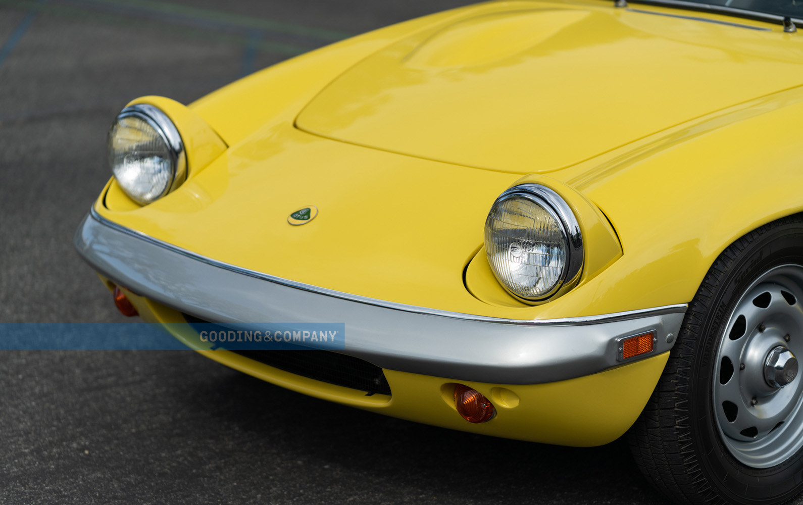 Yellow 1969 Lotus Elan SE-Front End, silver bumper with pop-up headlights. Exotic Car Loan