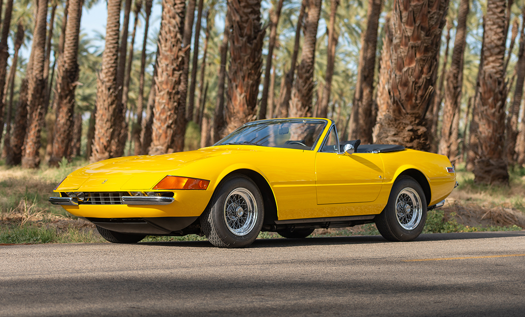 Yellow 1971 Ferrari Daytona Spider, front left