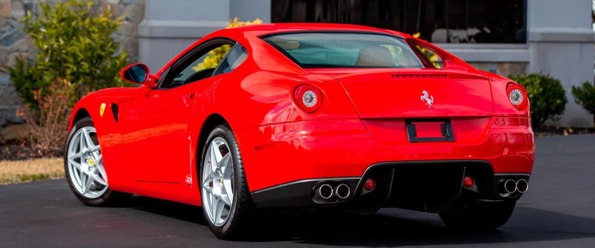 Red Ferrari 599 GTB rear left view