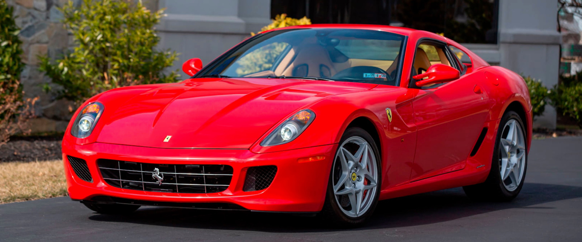 Red Ferrari 599 GTB front left view