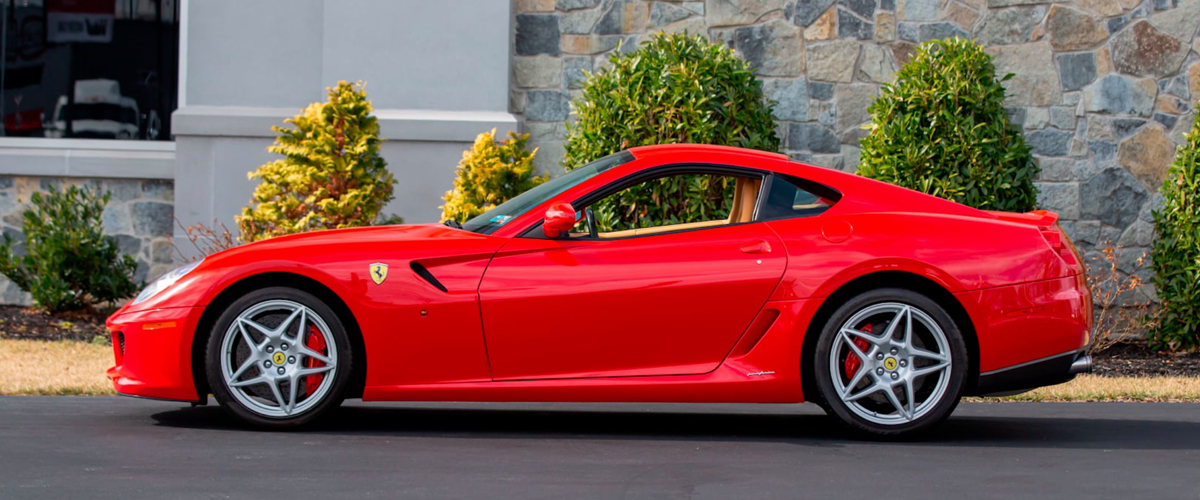 Red Ferrari 599 GTB left side view