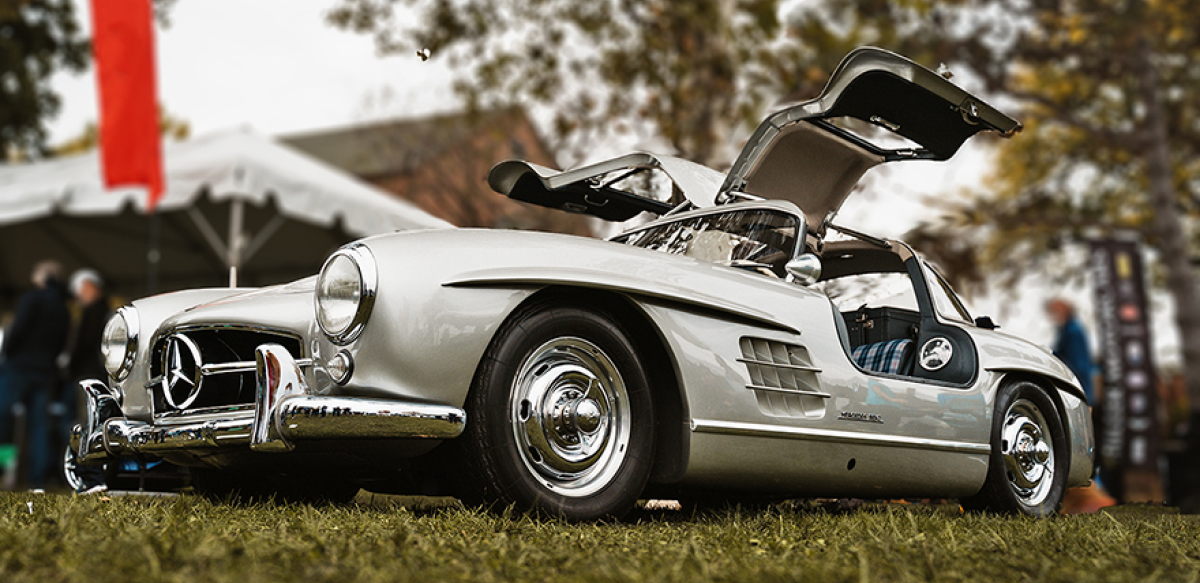 Silver Mercedes 300 SL Gullwing, doors open