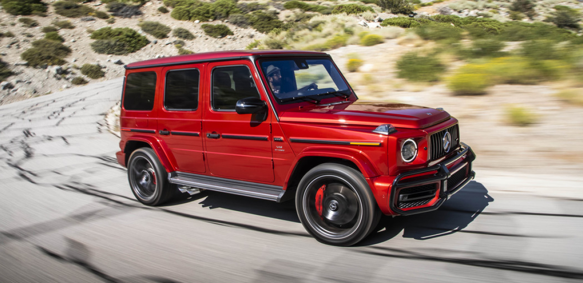 Red Mercedes AMG G63 on desert road