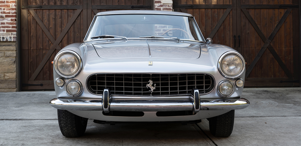 Silver Ferrari 250 GTE front view