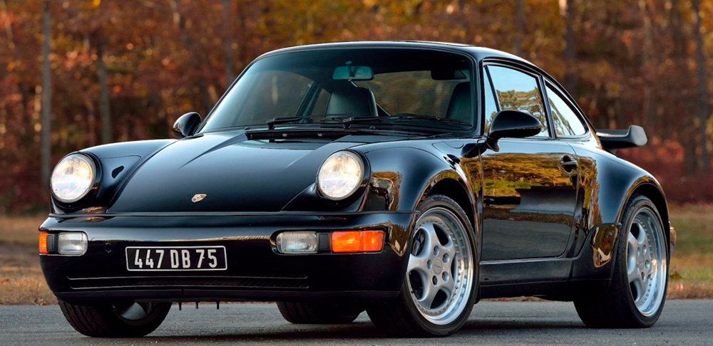 Black 1994 Porsche 911 Turbo front three-quarter view