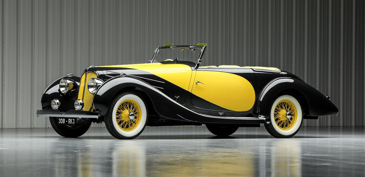 Black and yellow 1935 Delahaye135M Competition Drophead Coupe front left view
