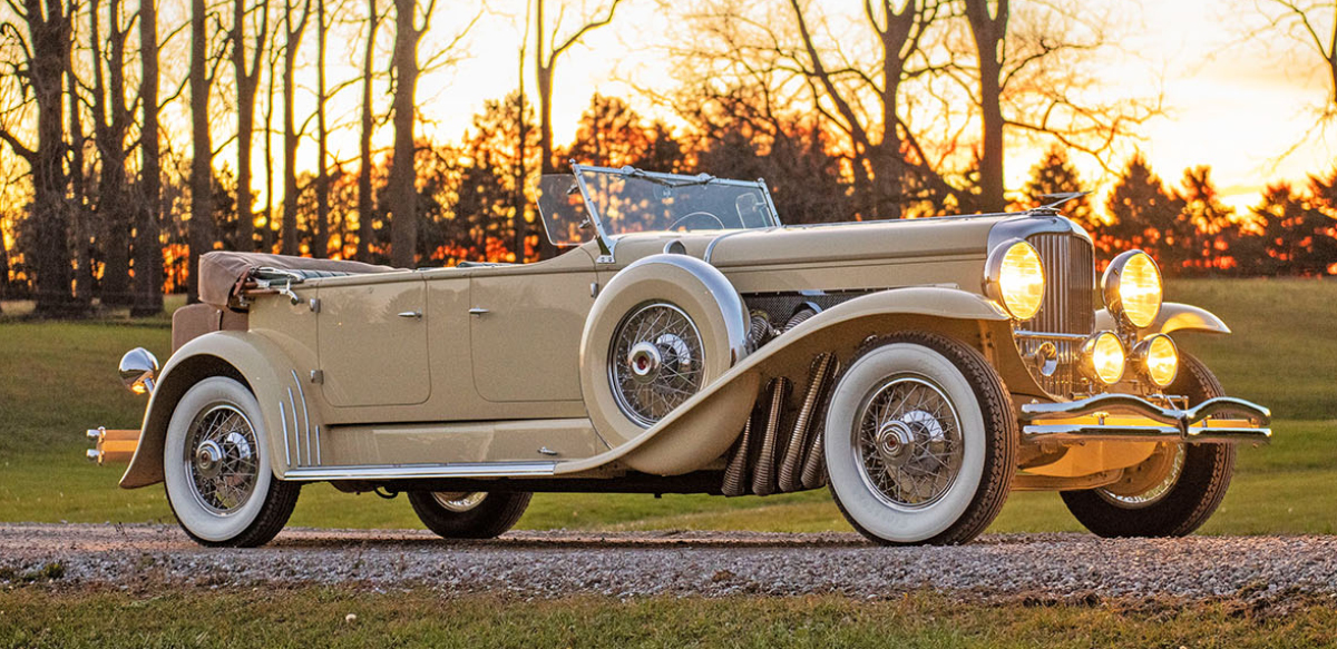 Yellow 1931 Duesenberg right front view