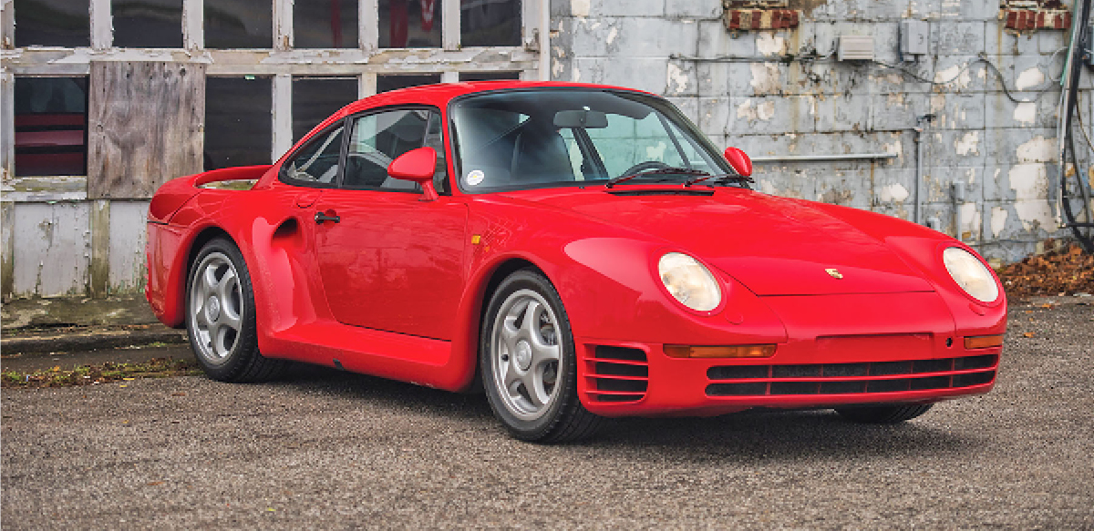 Red Porsche 959 right front view.