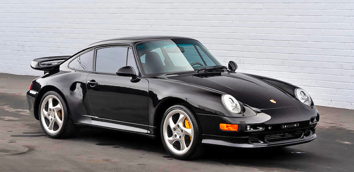 Black 1997 Porsche 911 Turbo S front right view.