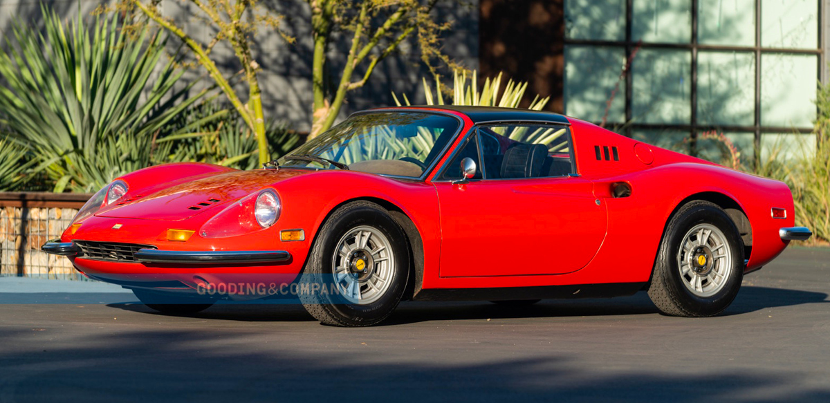 Red 1974 Ferrari Dino 246 GTS left side view.