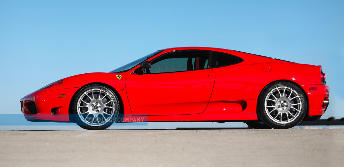 Red Ferrari 360 Challenge Stradale left side profile view. Red Ferrari 360 Challenge Stradale front right three-quarter view