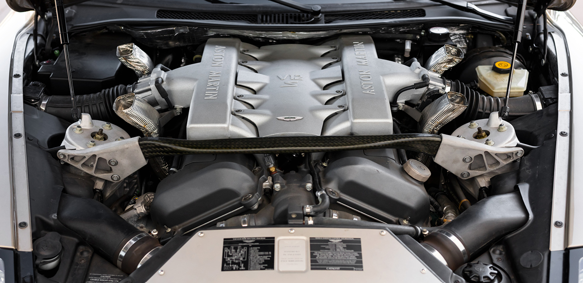 Gold Aston Martin Vanquish engine view