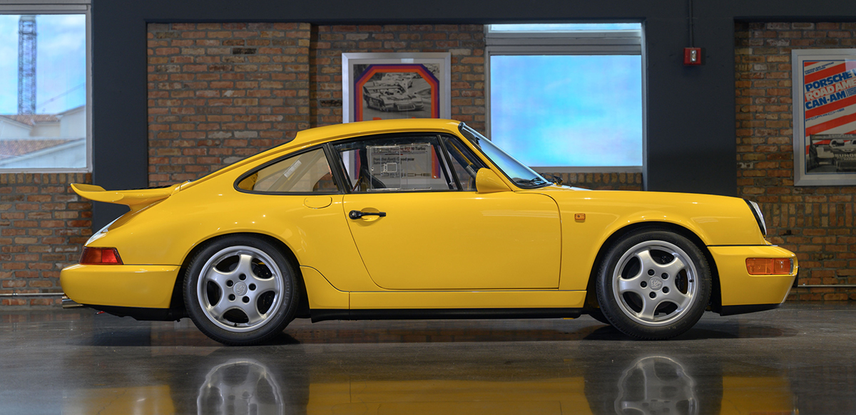 Yellow Porsche 911 Carrera 4 Lightweight Profile View