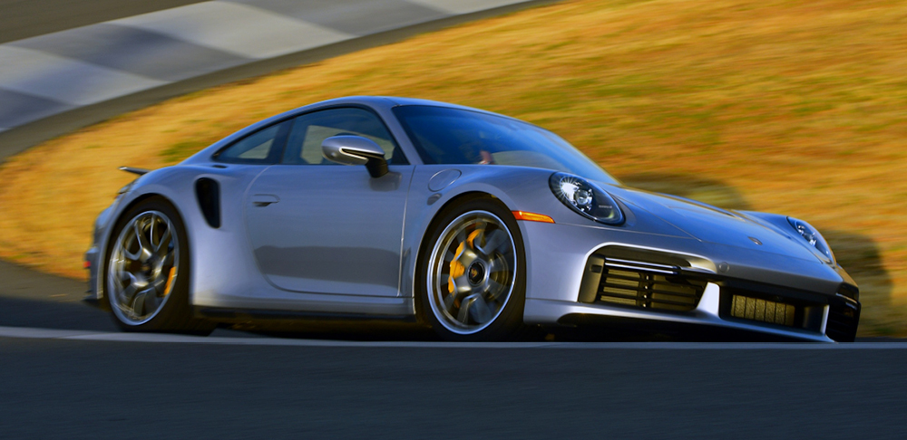 Silver Porsche 911 Turbo S Lightweight on race track