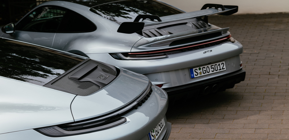 Silver 2022 Porsche 911 GT3 Touring and standard, rear view