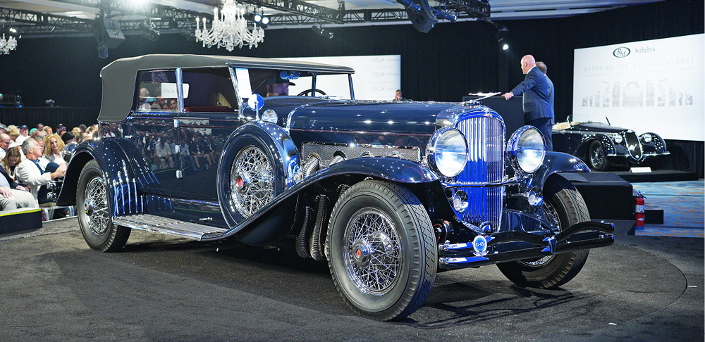 Blue 1930 Duesenberg at Amelia Island auction, front right view