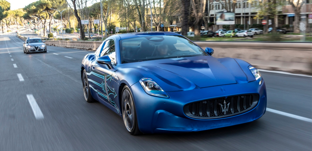 Blue Maserati GranTurismo “Folgore” driving on road
