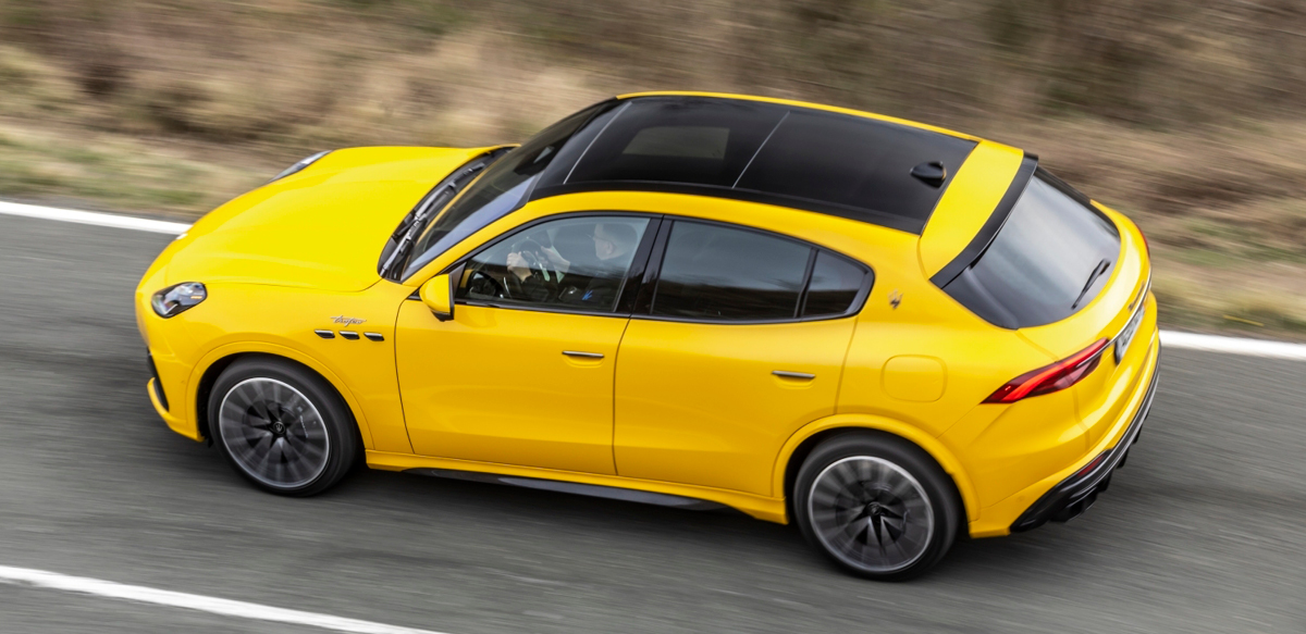 Yellow Maserati Grecale Trofeo, high view, driving