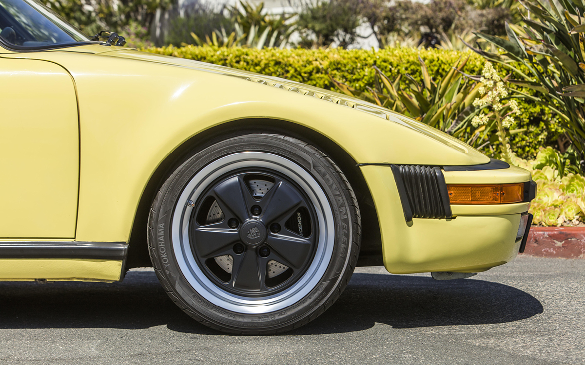 Yellow Porsche Carrera Turbo Look + Slant Nose front profile view