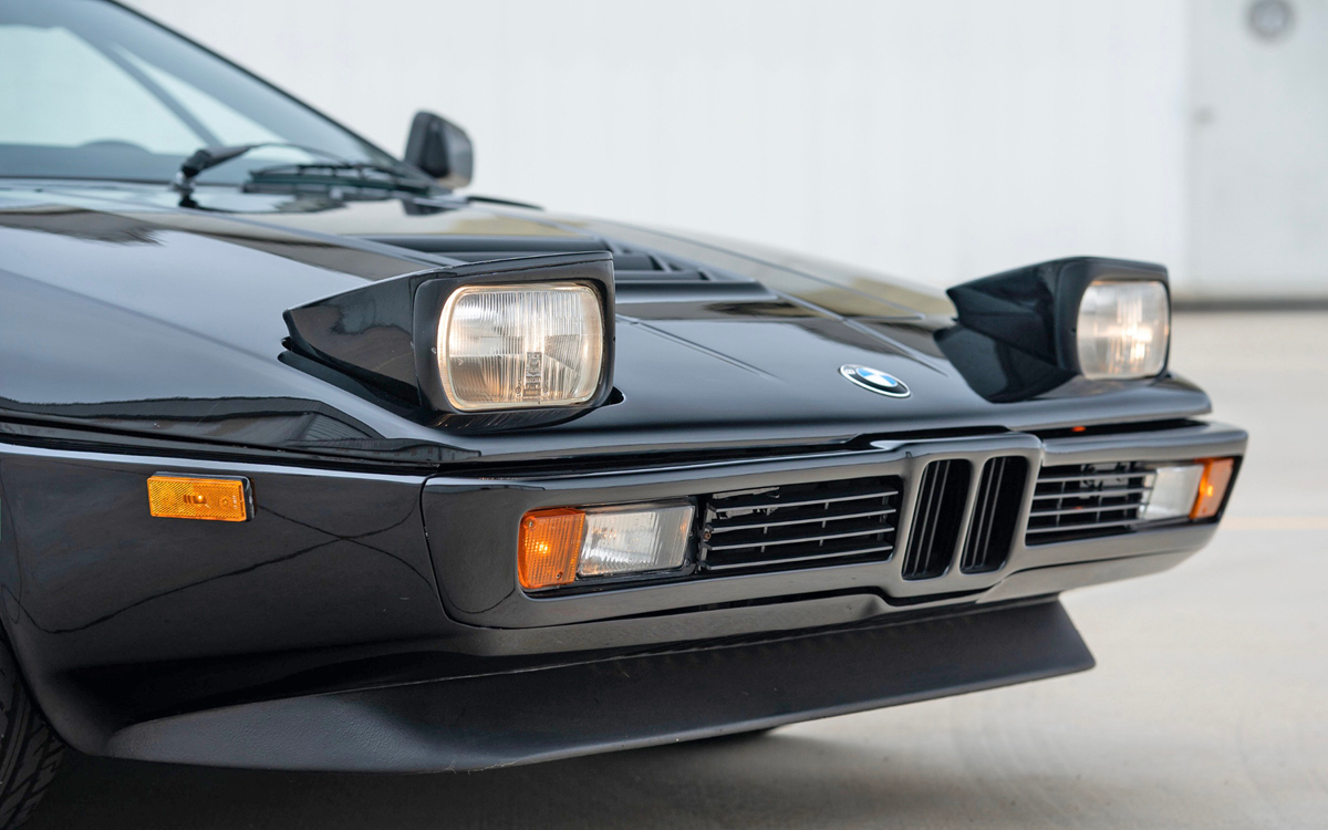 Black BMW M1 front close-up view