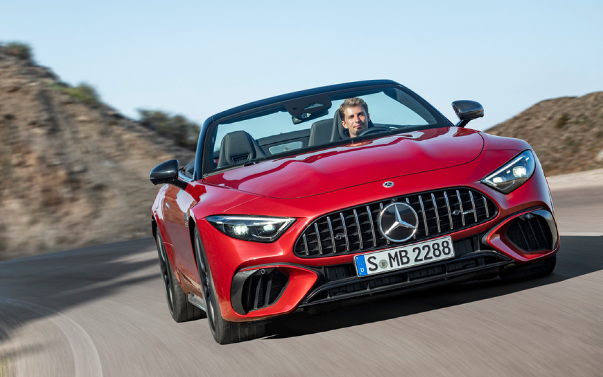 Red Mercedes-AMG SL on road, front view
