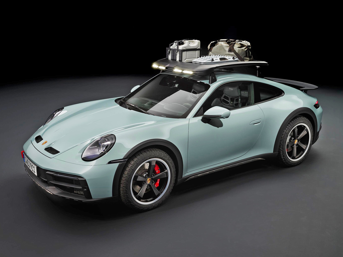 Green 2023 Porsche 911 Dakar, studio shot