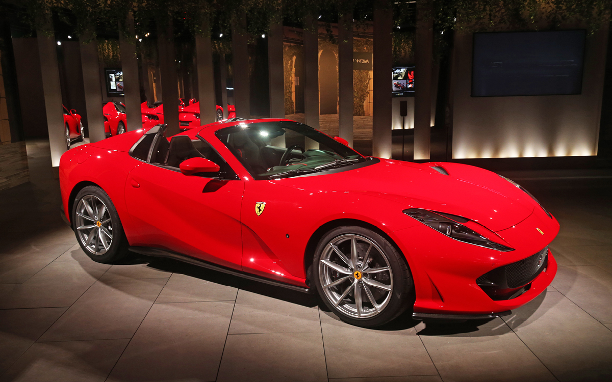 Red Ferrari 812 GTS left front view with top down