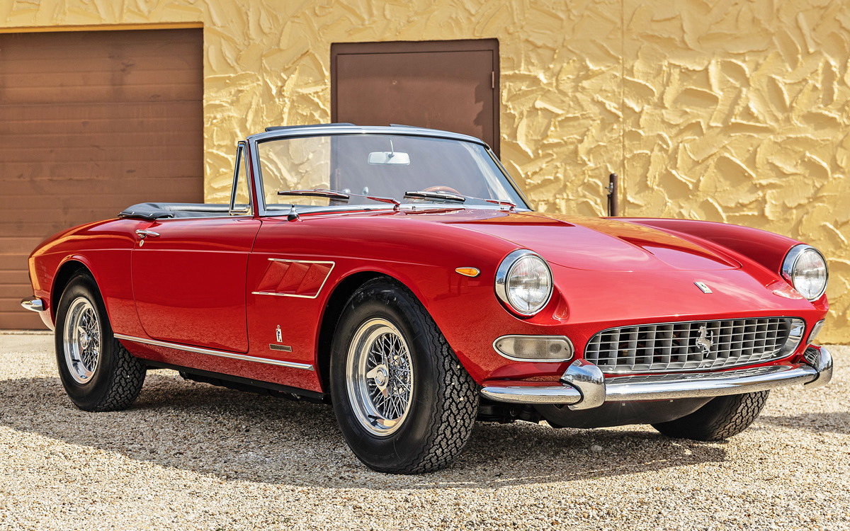 Red Ferrari 275 GTS left front view