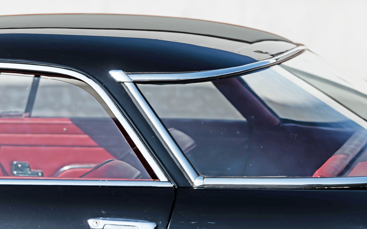 Black Maserati 5000 GT window close-up
