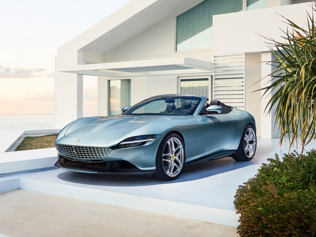 Blue Ferrari Roma Spider left front view