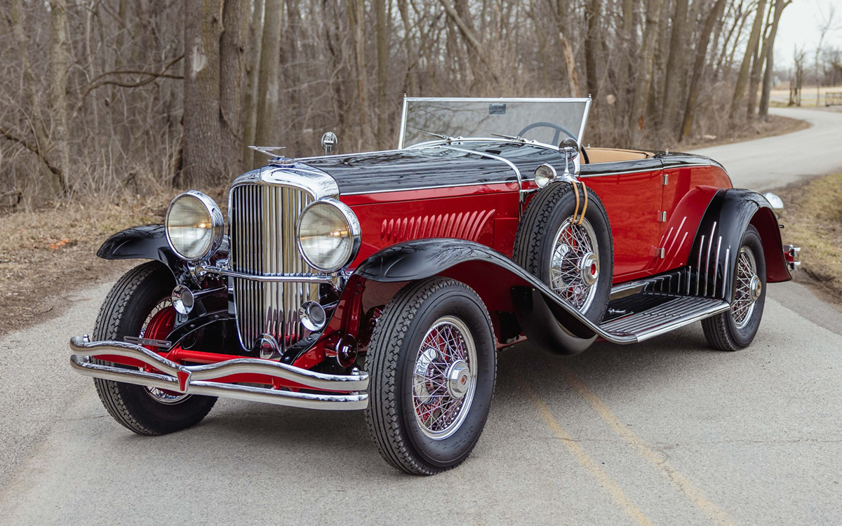 Red and black 1931 Duesenberg left front view