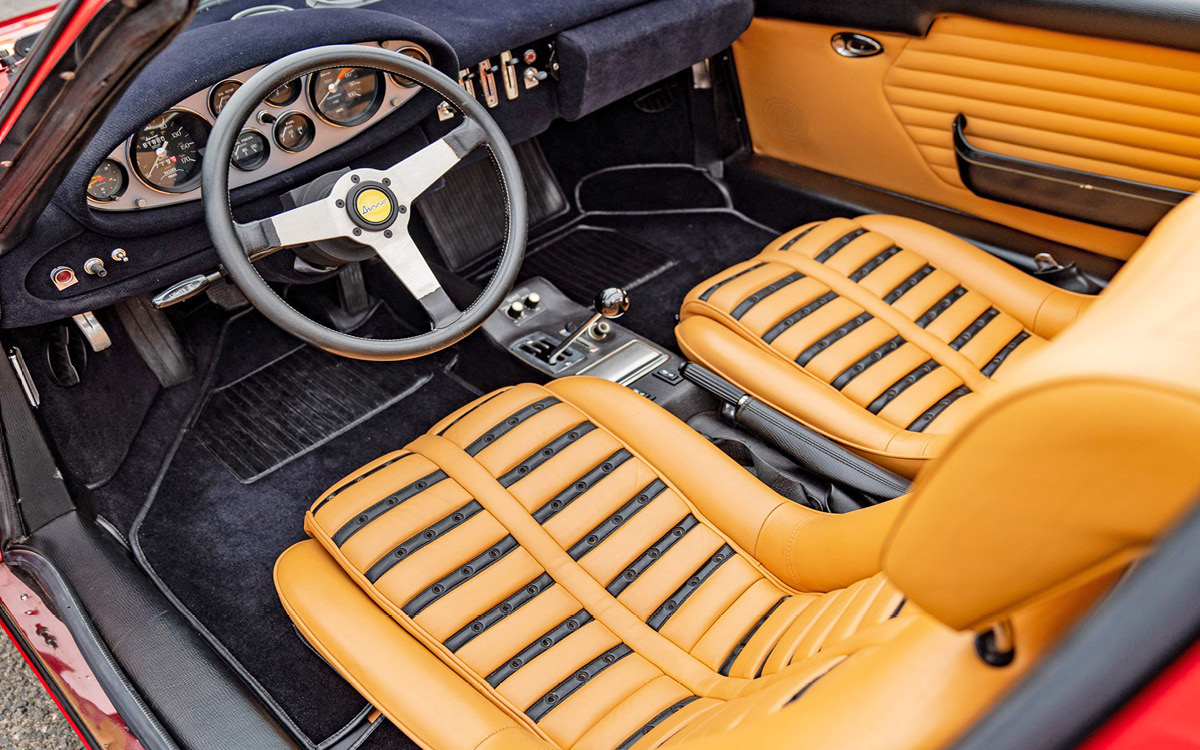 Red Ferrari Dino 246 GTS “chairs and flares” interior
