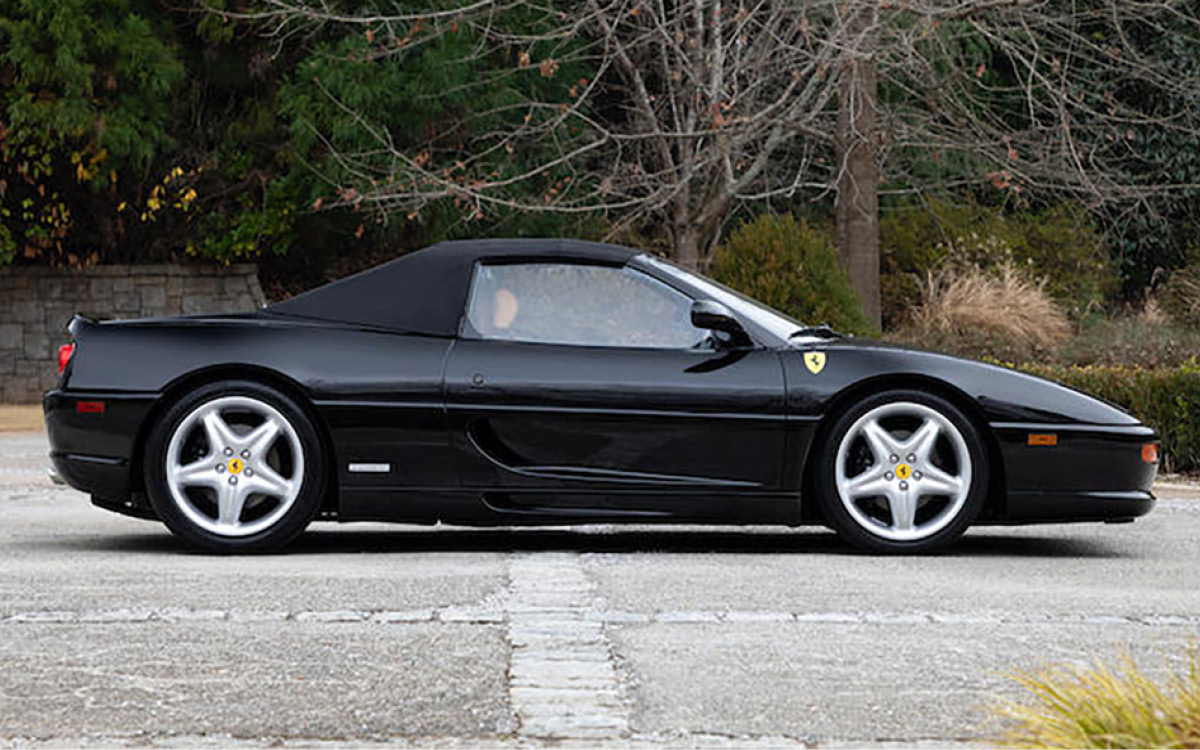 Black Ferrari F355 Spider left side view