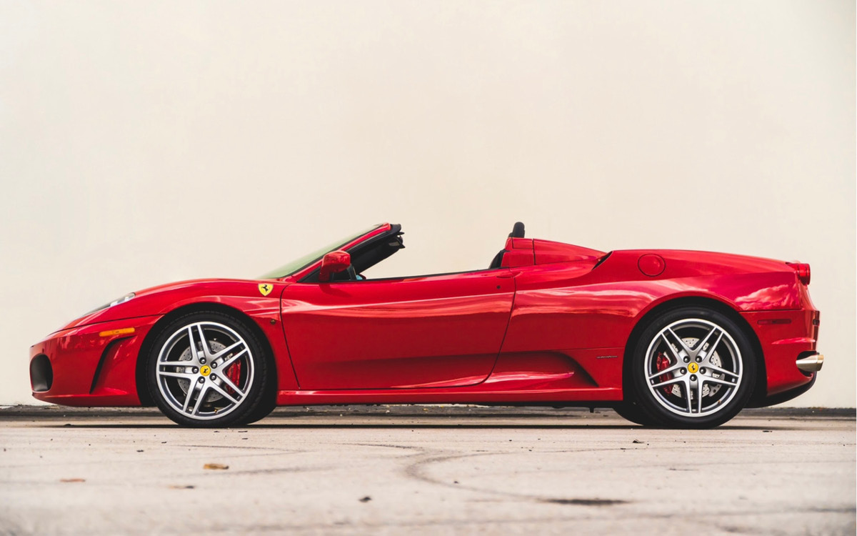 Red Ferrari F430 Spider left view, top down