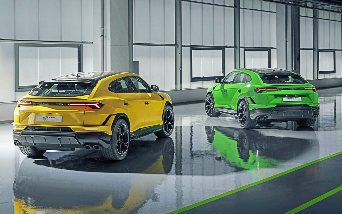 Viper Green and Yellow Lamborghini Urus Performante models, rear view