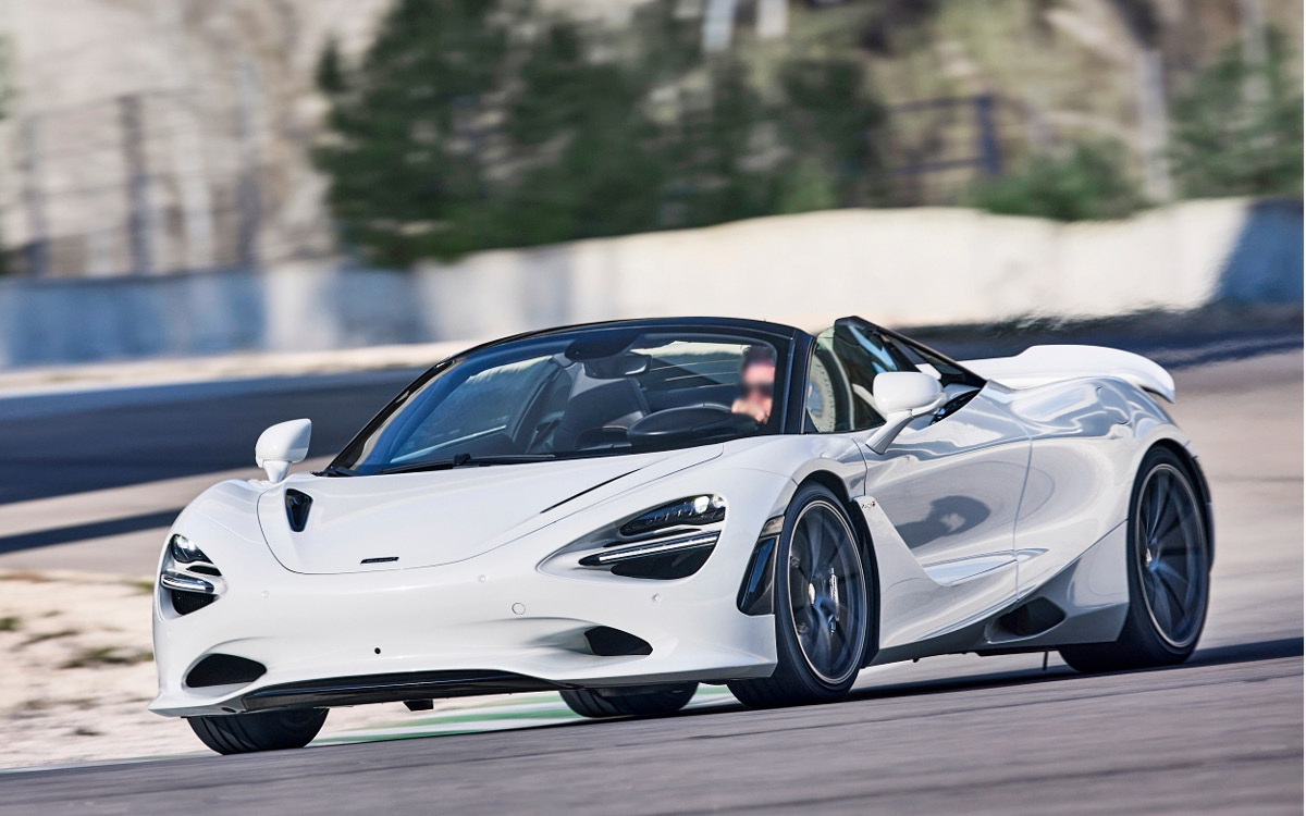 White McLaren 750S Spider on road, left front view