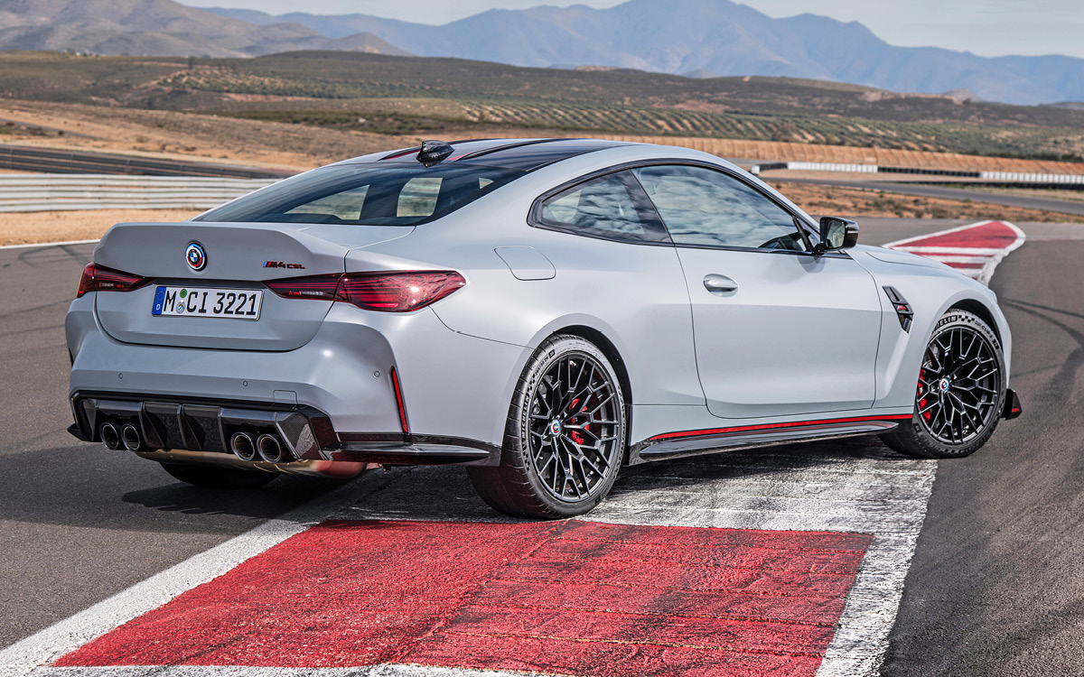 Gray BMW M4 CSL on track, rear view