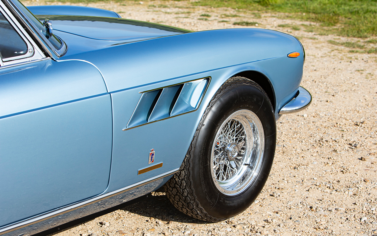 Blue Ferrari 330 GTS fender vent detail view