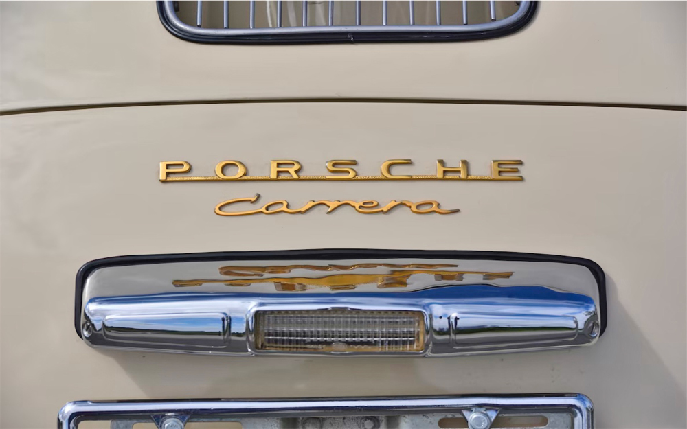 Cream color Porsche 356 Speedster Carrera badge detail