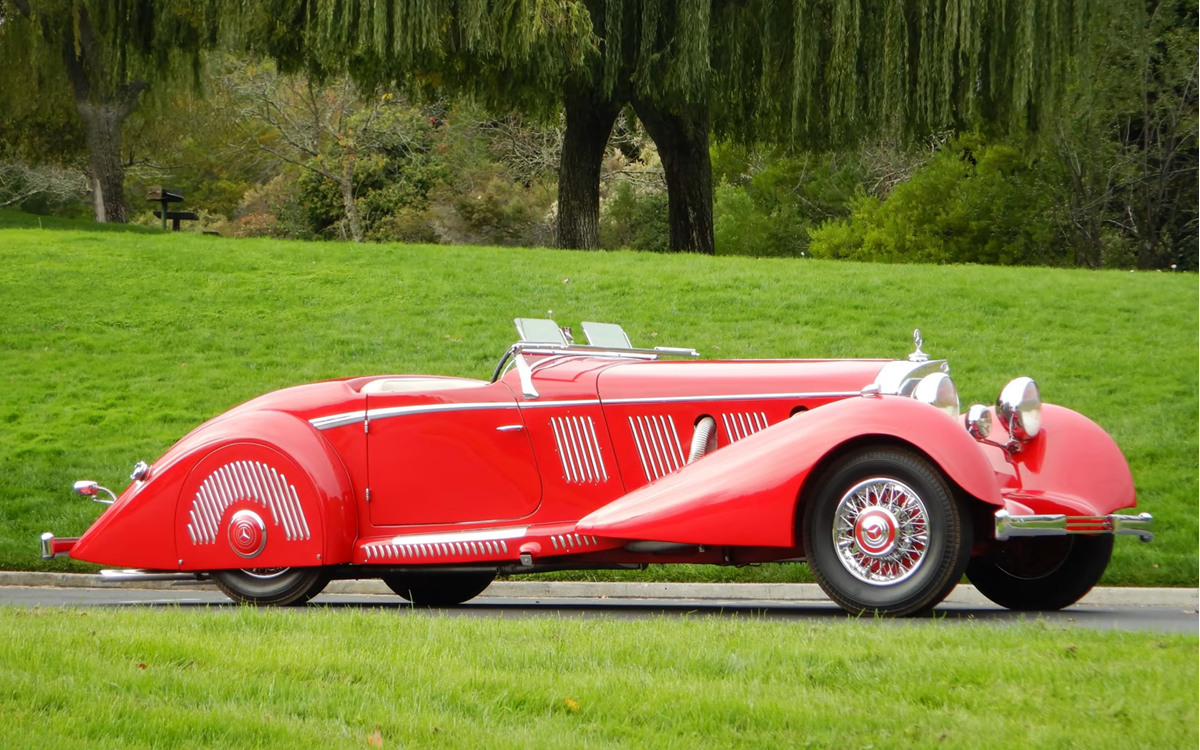 Red 1937 Mercedes 540K left side view