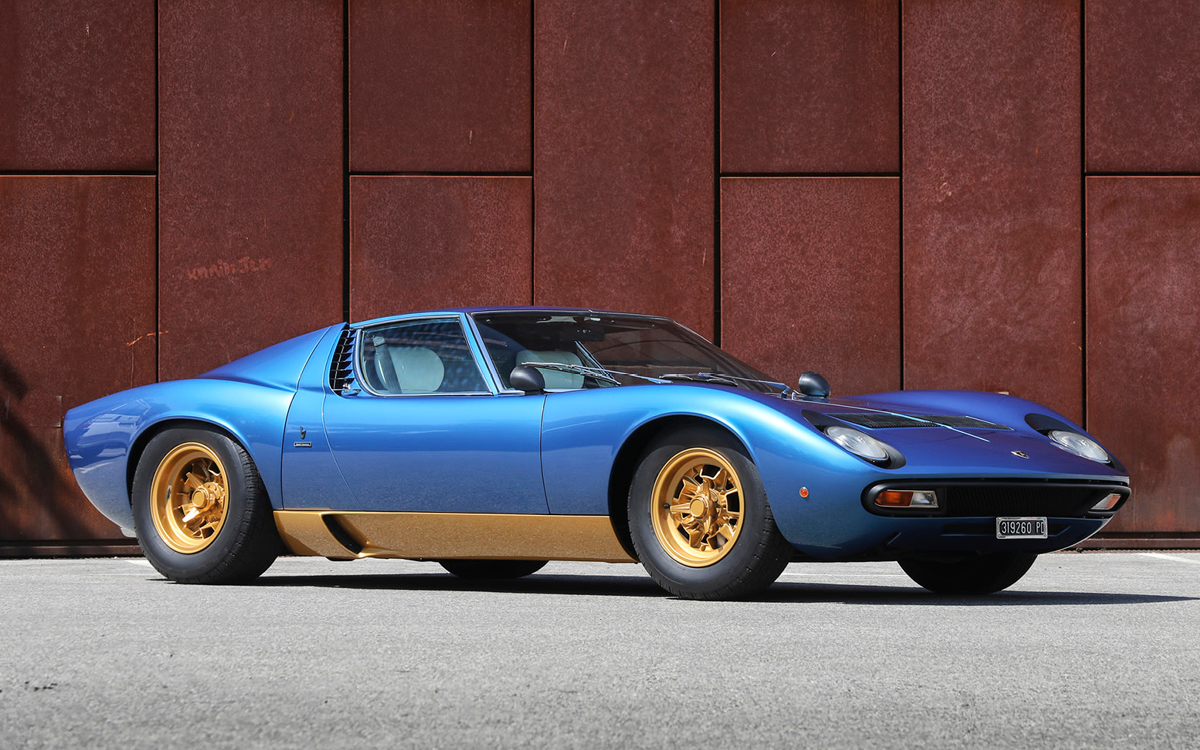 Blue and gold Lamborghini Miura SV left side view