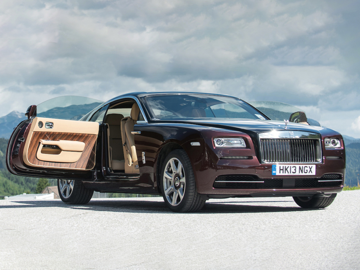 Maroon Rolls-Royce Wraith front view coach doors open