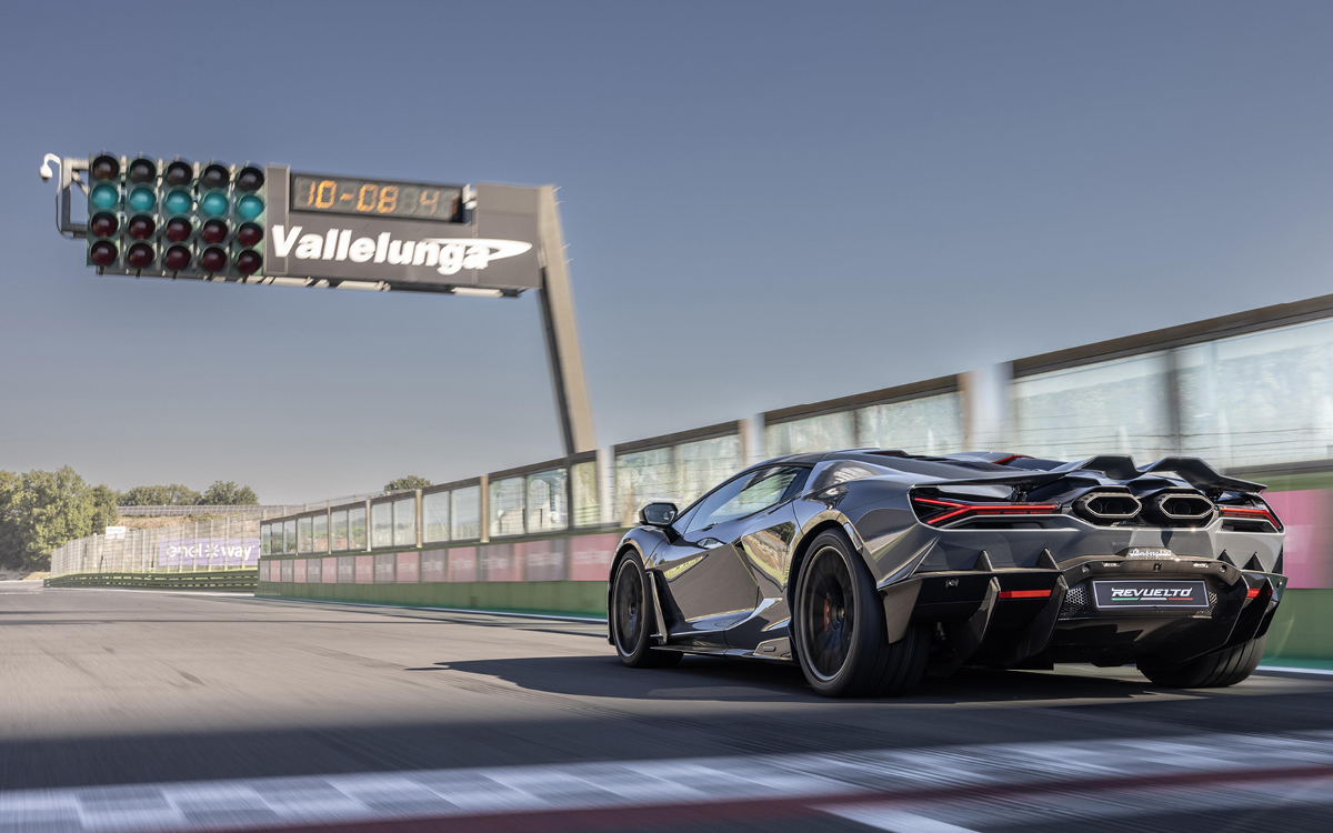 Gray Lamborghini Revuelto on track rear view