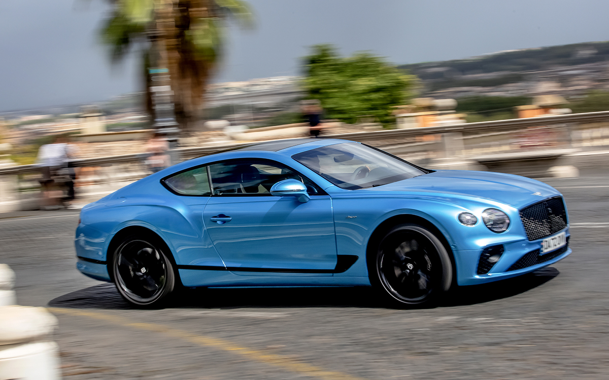 Blue Bentley Continental GT on road